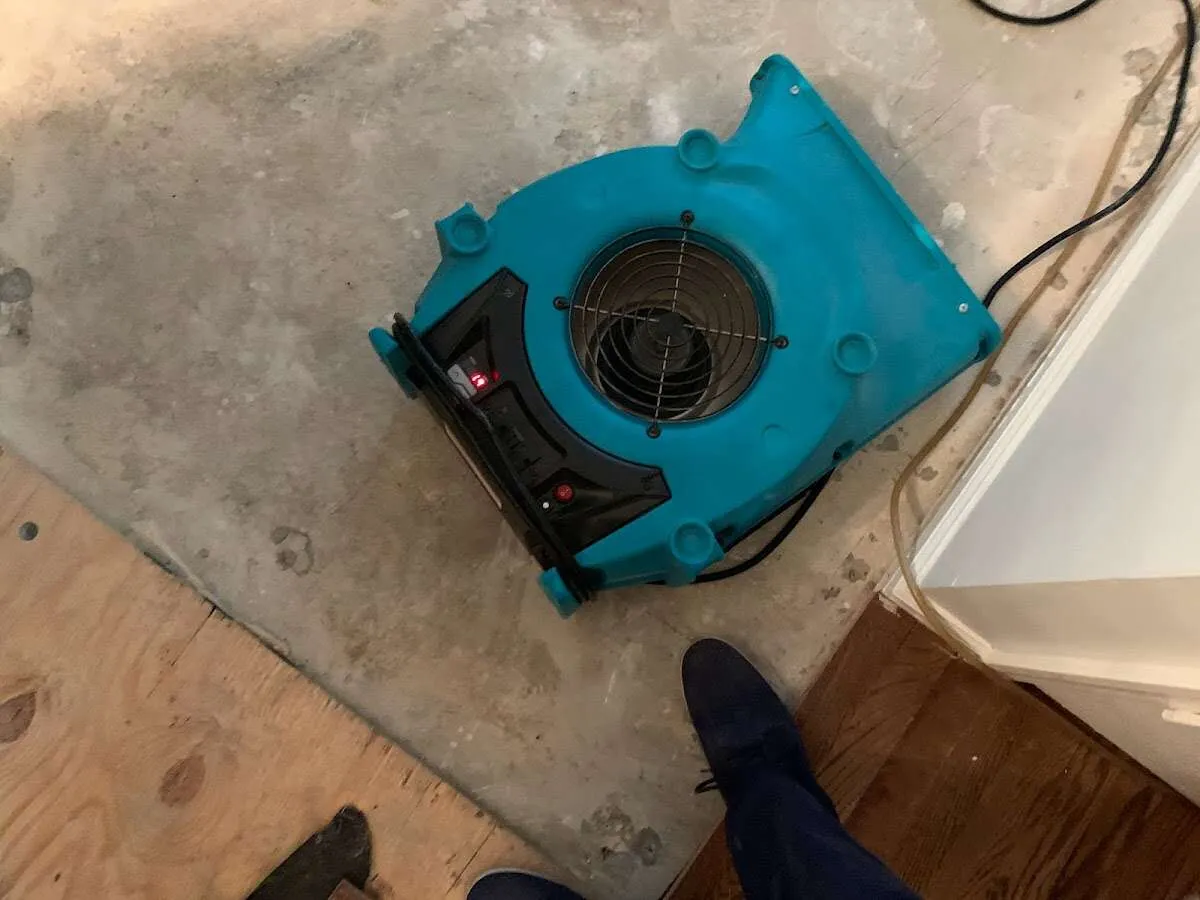 Air mover drying subfloor during Leak Detection & Repair in East San Gabriel